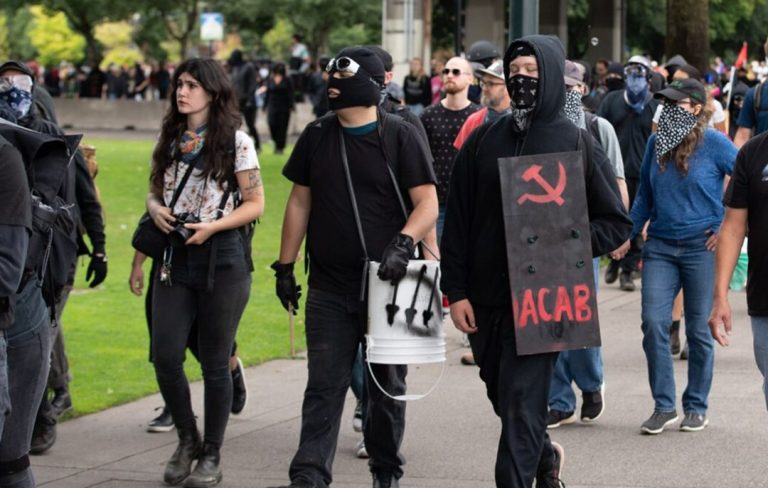 Clashes Erupt at Seattle Christian Rally: 23 Arrested Amidst Ideological Tensions