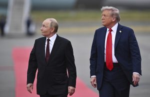 Body language expert ‘reveals’ chilling reason for Putin’s hand gesture after Trump flies nuclear bombers over president’s head